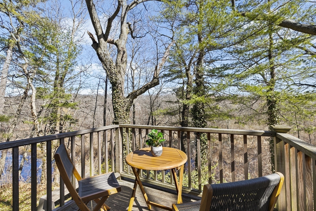 25 Duffield Road Newton, MA 02466 - Photo 17 of 19 a view of a balcony with furniture and wooden deck