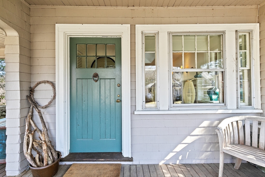 25 Duffield Road Newton, MA 02466 - Photo 2 of 19 a view of porch with a door and a window