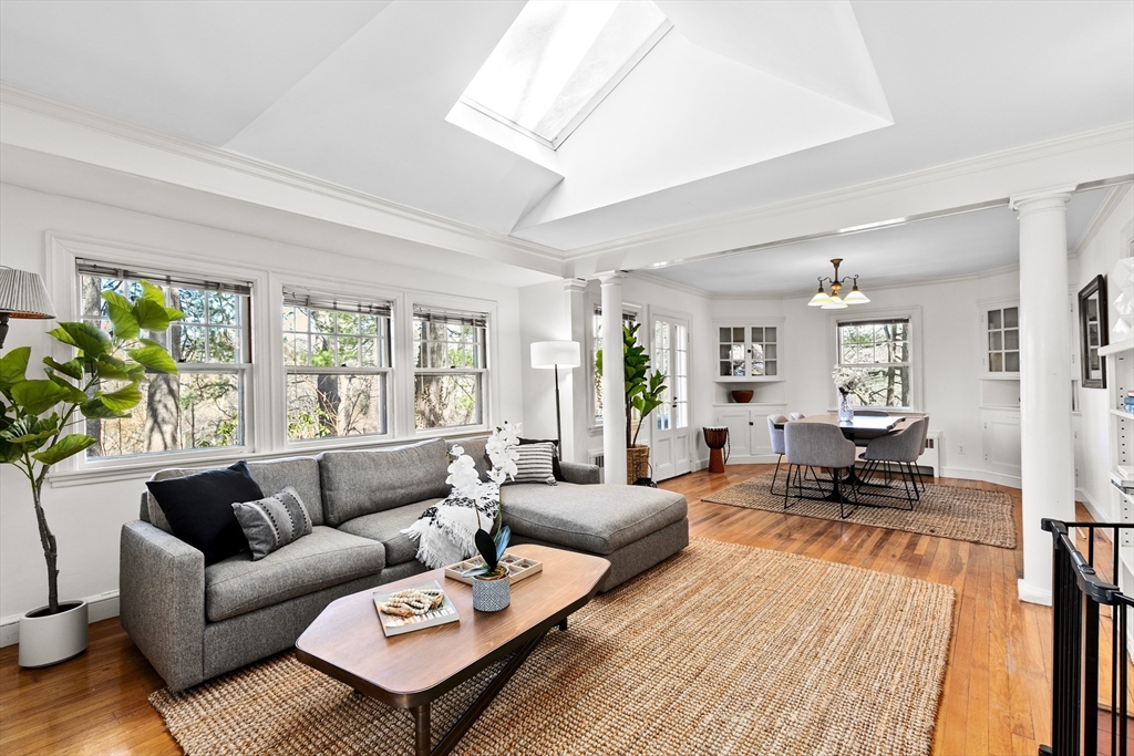 25 Duffield Road Newton, MA 02466 - Photo 3 of 19 a living room with furniture wooden floor and a large window