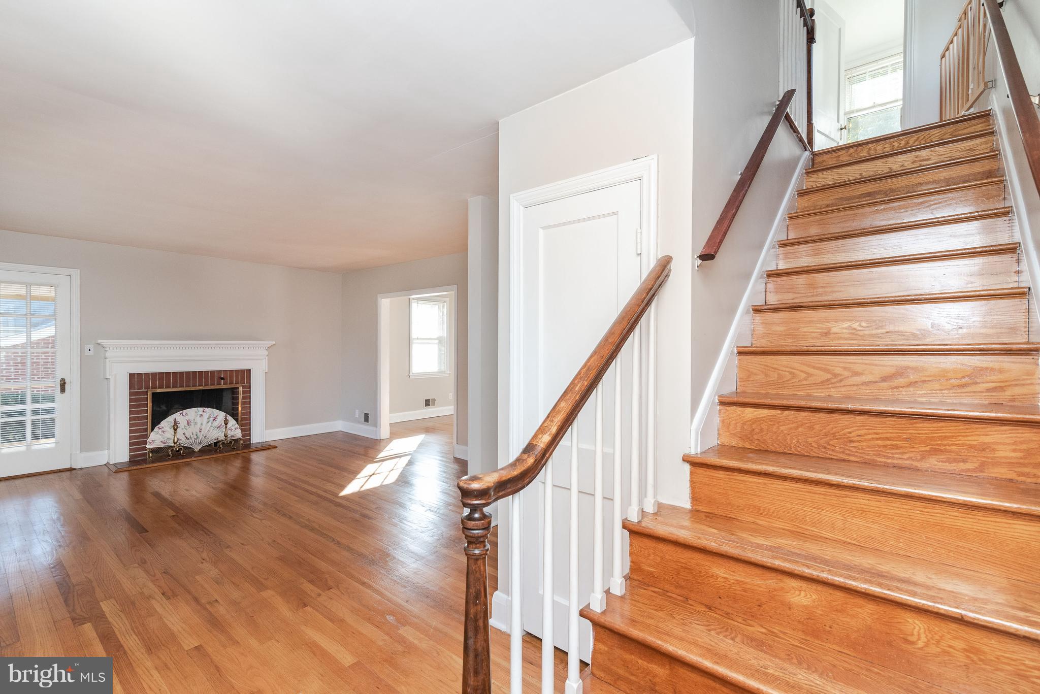 509 Forest View Road Linthicum Heights, MD 21090 - Photo 8 of 44 Living Room and Staircase