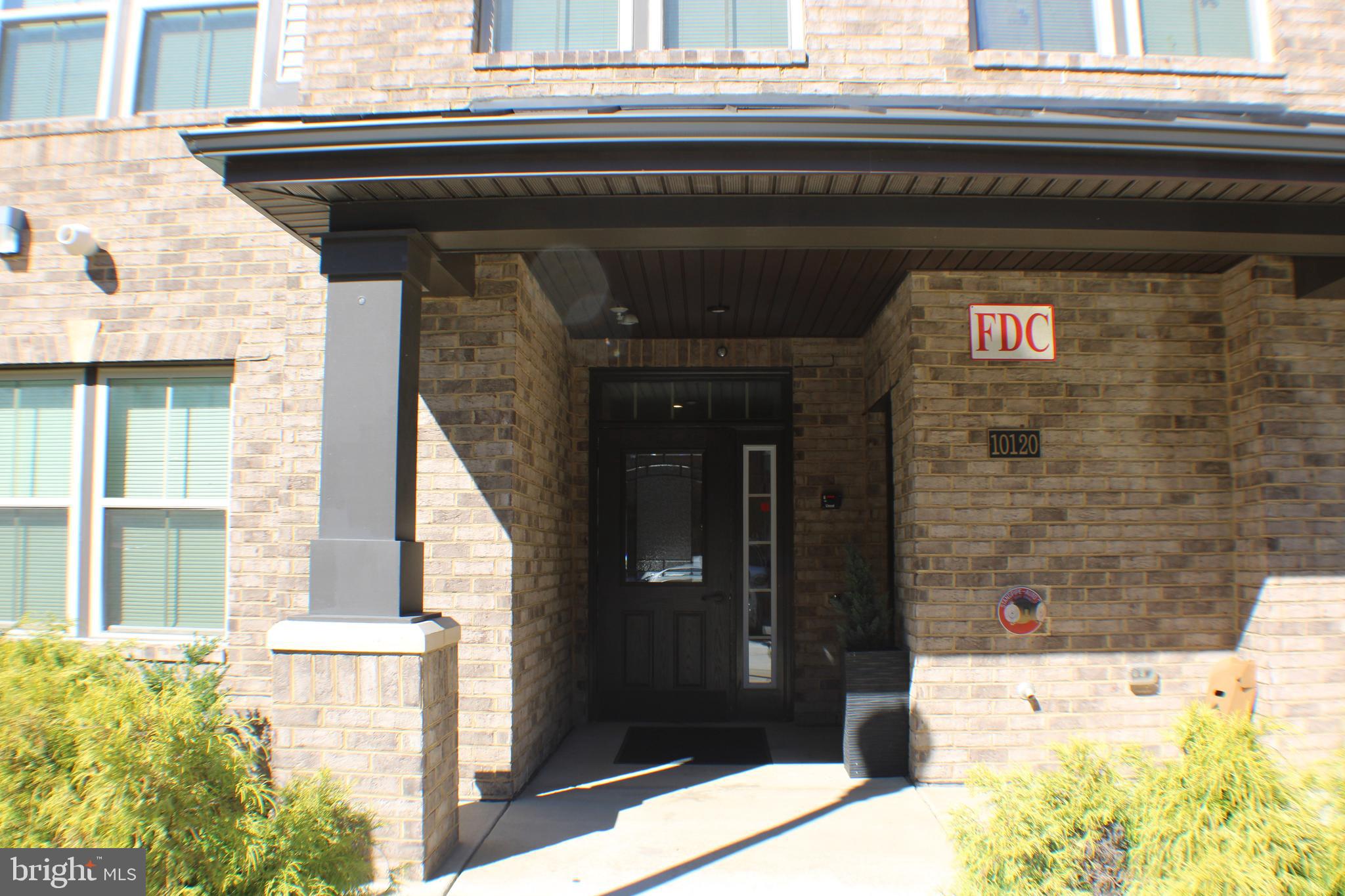 10120 Seattle Slew Lane, Unit P Laurel, MD 20723 - Photo 22 of 22 a view of a door of the house