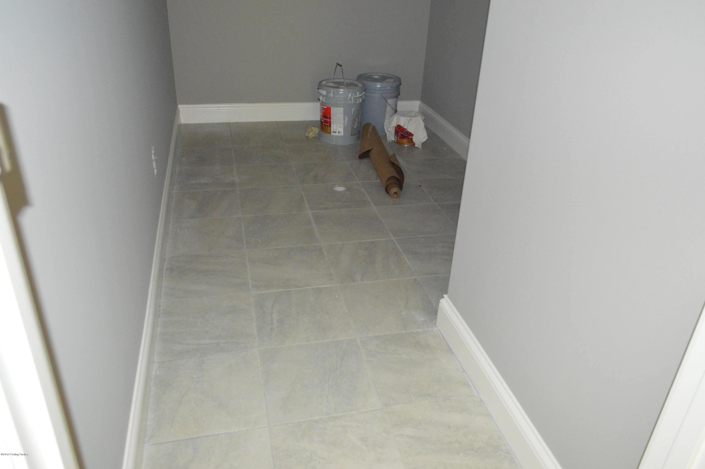 523 Wooded Falls Road Louisville, KY 40243 - Photo 12 of 22 Tiled floor in laundry