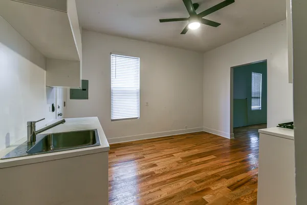 a view of a kitchen with sink and dishwasher