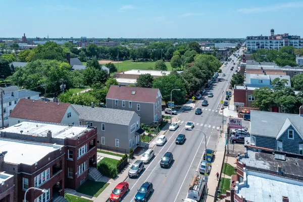 an aerial view of a house with a garden