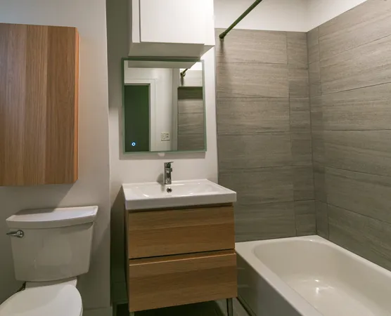 a bathroom with a sink a toilet and a bathtub