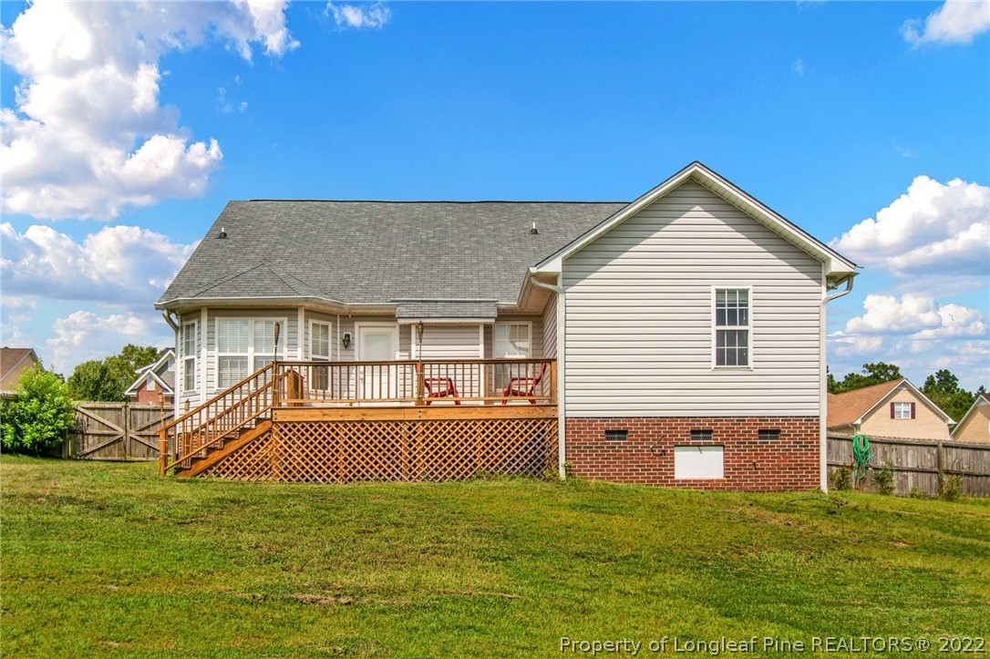 5415 Spreading Branch Road Hope Mills, NC 28348 - Photo 2 of 12 a view of a house with a yard