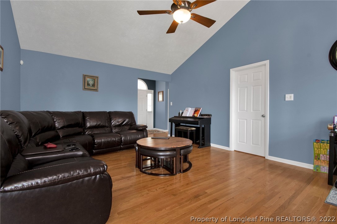 5415 Spreading Branch Road Hope Mills, NC 28348 - Photo 5 of 12 a living room with furniture and a flat screen tv