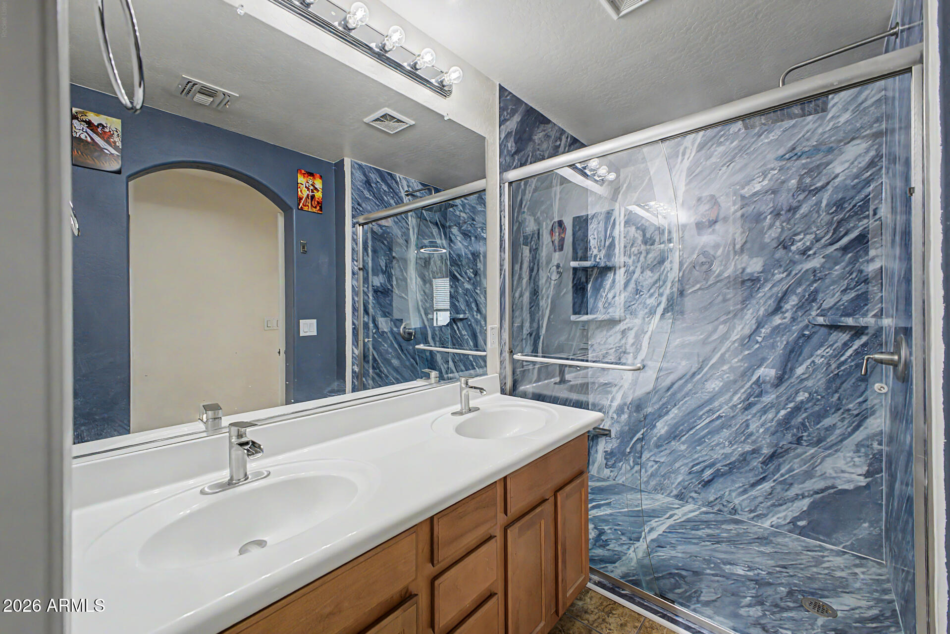 435 North Ranger Trail Gilbert, AZ 85234 - Photo 14 of 20 a bathroom with a sink and a mirror