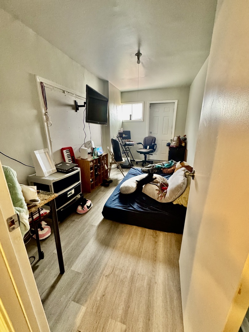 11345 South Ada Street Chicago, IL 60643 - Photo 6 of 15 a living room with furniture and a flat screen tv