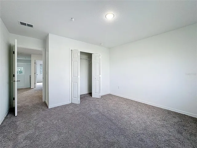 an empty room with closet