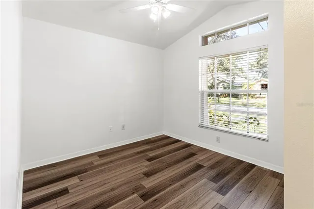 a view of an empty room and window