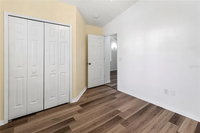 a view of a livingroom with wooden floor