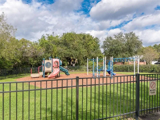 a view of a backyard with trees