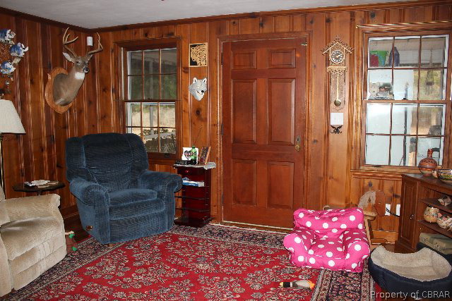 391 Haven Beach Road Moon, VA 23119 - Photo 9 of 43 a living room with furniture and window