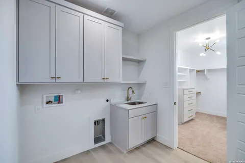 a living room with furniture pool table and a window