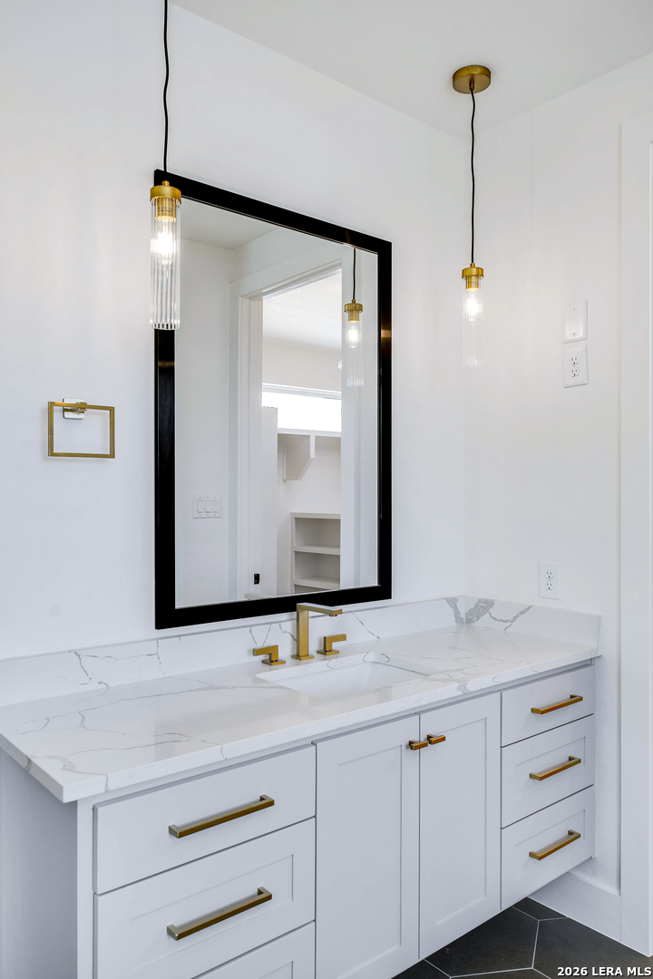 486 James Castroville, TX 78009 - Photo 21 of 29 a bathroom with a sink and mirror