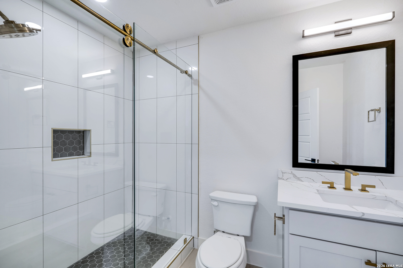 486 James Castroville, TX 78009 - Photo 27 of 29 a bathroom with a sink a toilet and shower