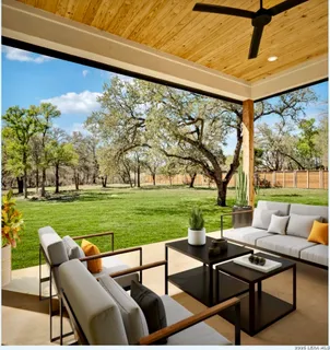 a view of a big room with a large tree