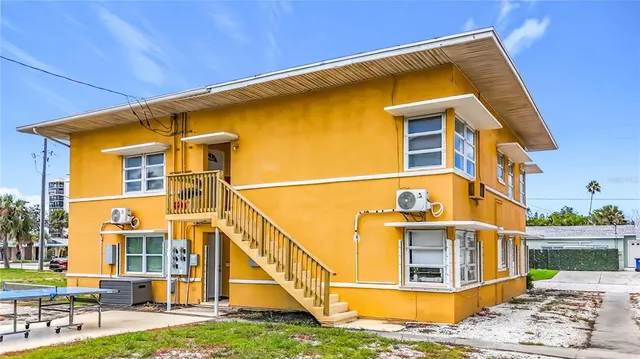 a front view of a house with entertaining space