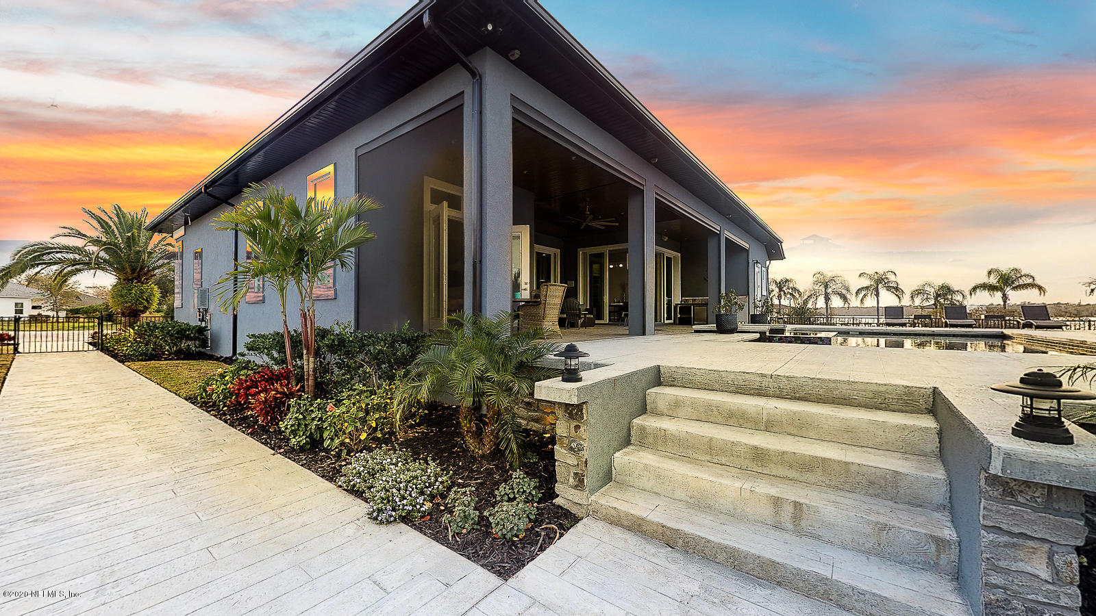 2121 Romeo Point Lane Fleming Island, FL 32003 - Photo 43 of 59 Twilight Exterior Rear Left