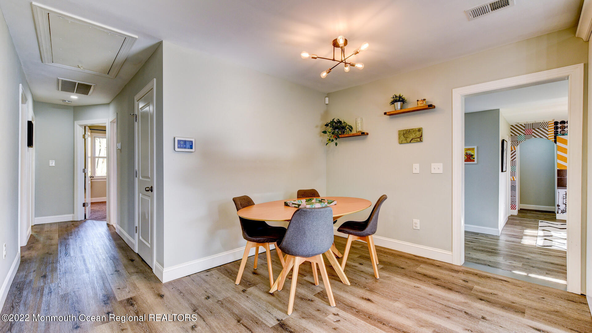 204 Paint Island Spring Road Millstone Township, NJ 08510 - Photo 17 of 30 a view of a dining room with furniture and wooden floor
