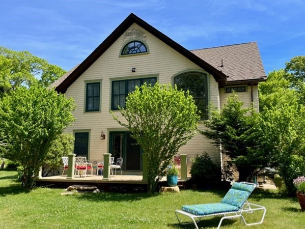 165 Christiantown Road West Tisbury, MA 02568 - Photo 1 of 8 a front view of a house with a yard