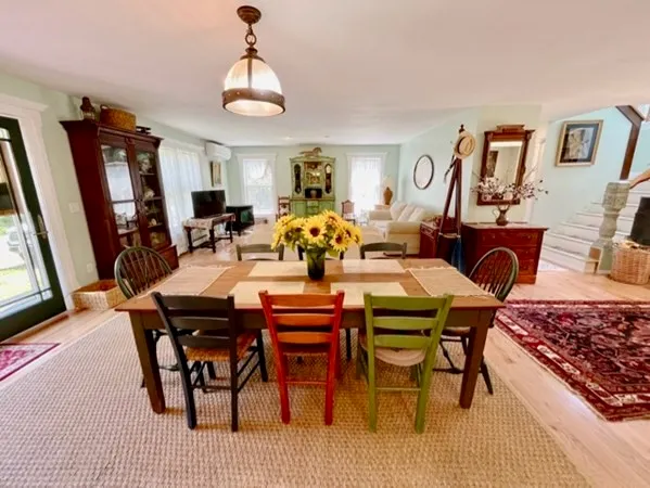 a view of a dining room with furniture