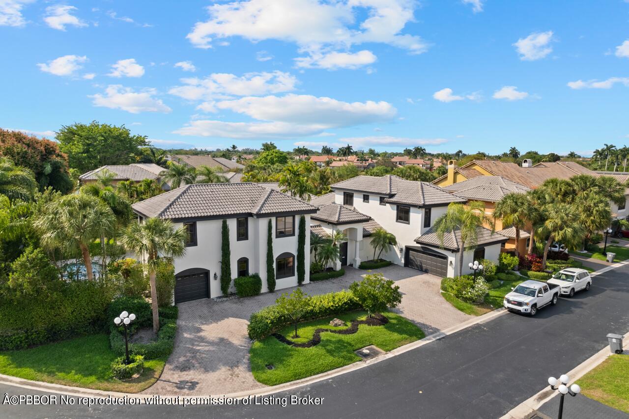 22771 El Dorado Drive Boca Raton, FL 33433 - Photo 22 of 24 a view of a street with houses