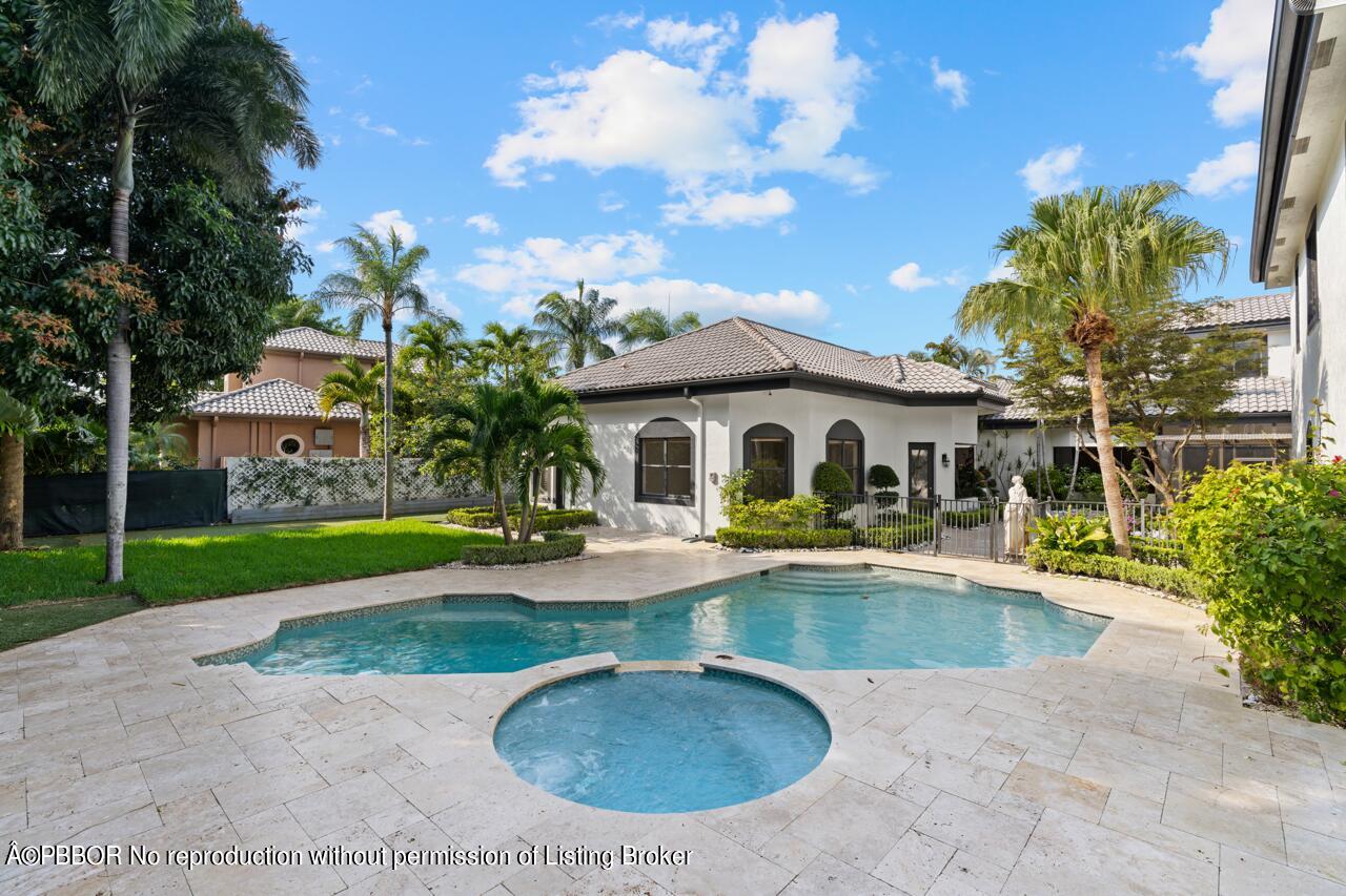 22771 El Dorado Drive Boca Raton, FL 33433 - Photo 9 of 24 a view of a house with swimming pool and sitting area