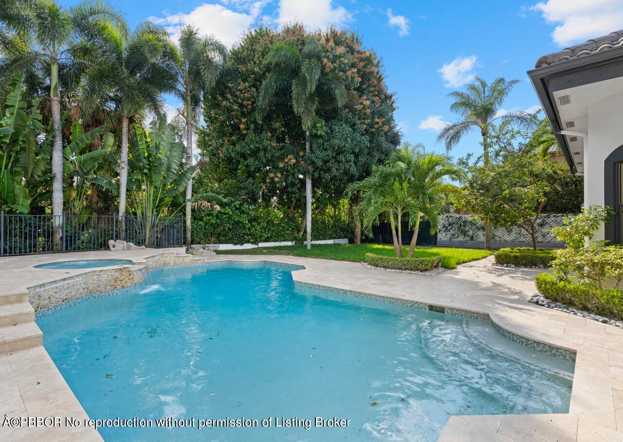 22771 El Dorado Drive Boca Raton, FL 33433 - Photo 10 of 24 a view of swimming pool with a yard