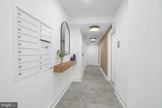 a view of entryway with wooden floor
