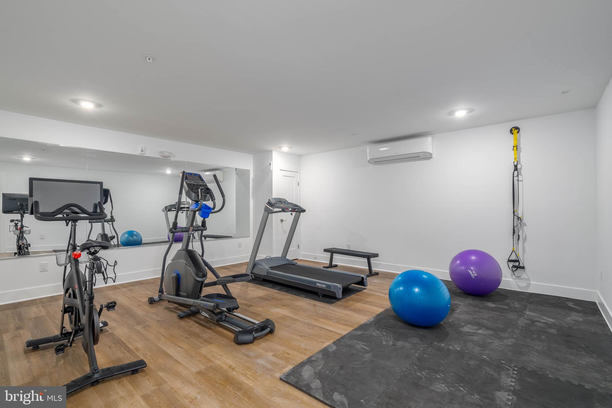 825 Bainbridge Street, Unit 101 Philadelphia, PA 19147 - Photo 25 of 27 a view of a room with gym equipment
