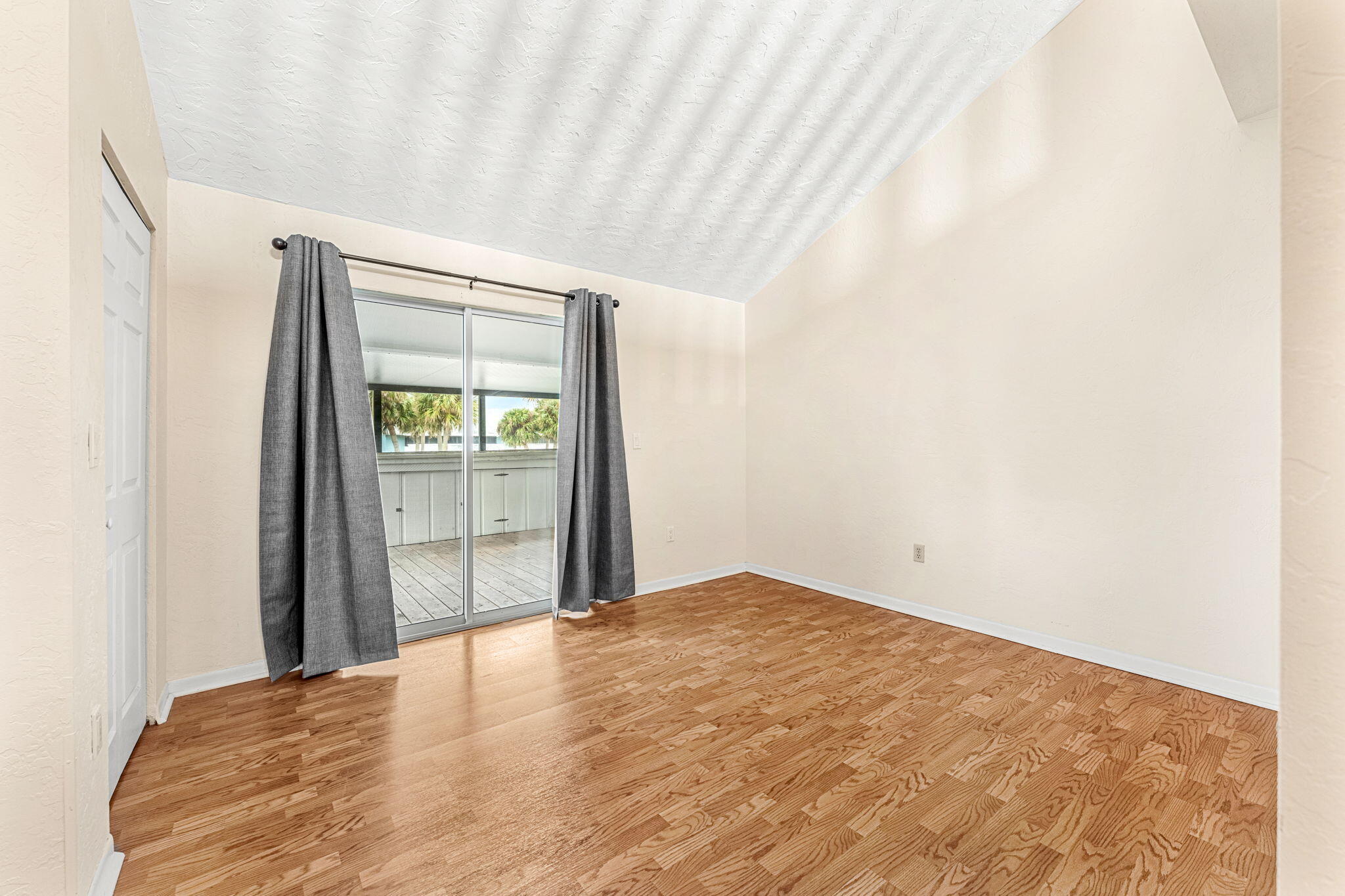 3 Cove Road, Unit 3 Melbourne Beach, FL 32951 - Photo 20 of 40 a view of an empty room with a window