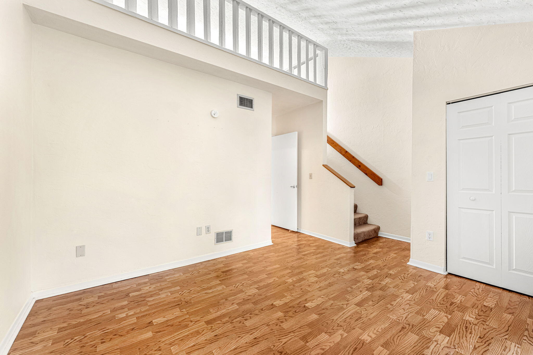 3 Cove Road, Unit 3 Melbourne Beach, FL 32951 - Photo 21 of 40 a view of a hallway with staircase