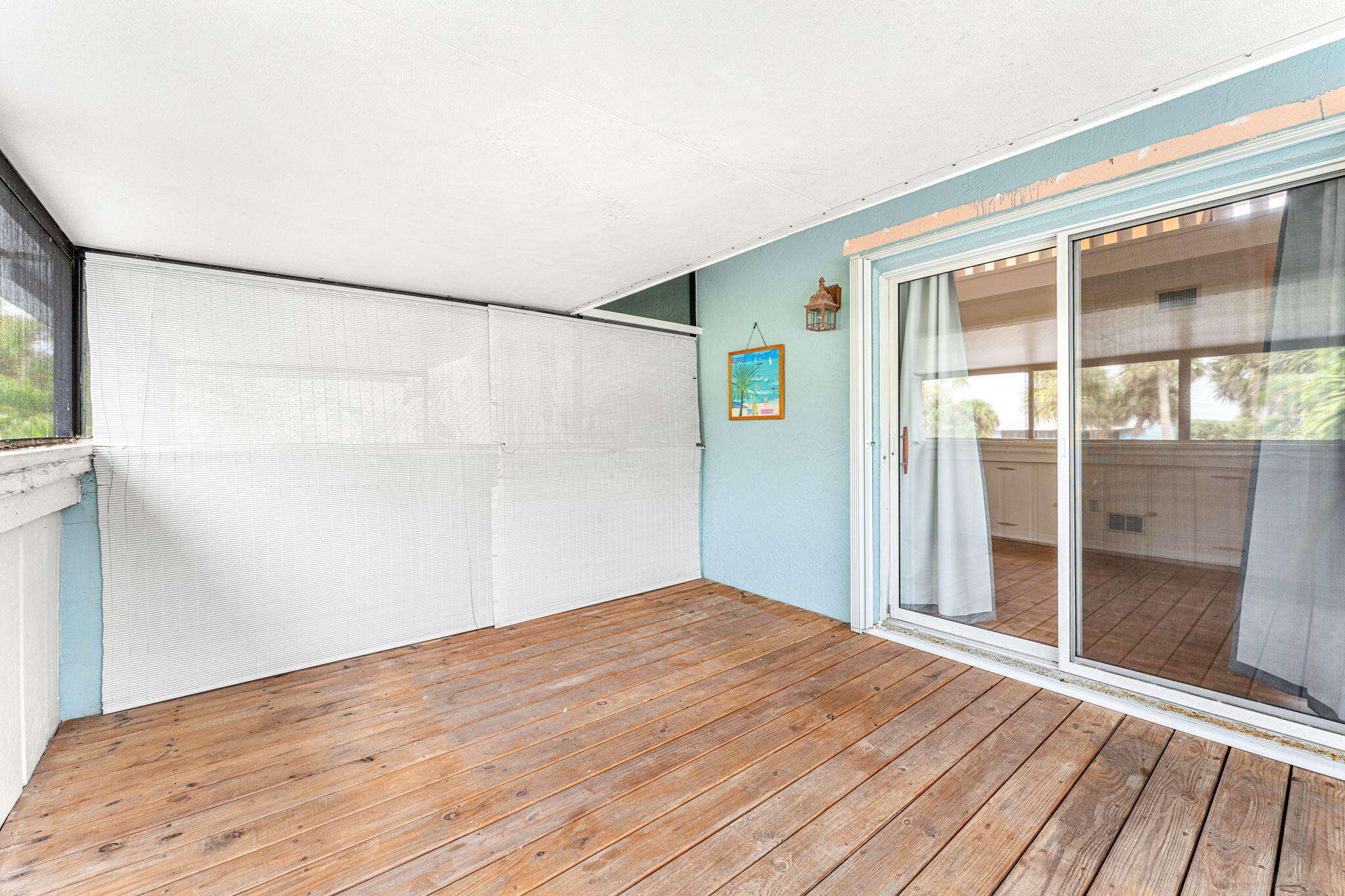 3 Cove Road, Unit 3 Melbourne Beach, FL 32951 - Photo 23 of 40 a view of empty room with wooden floor and fan