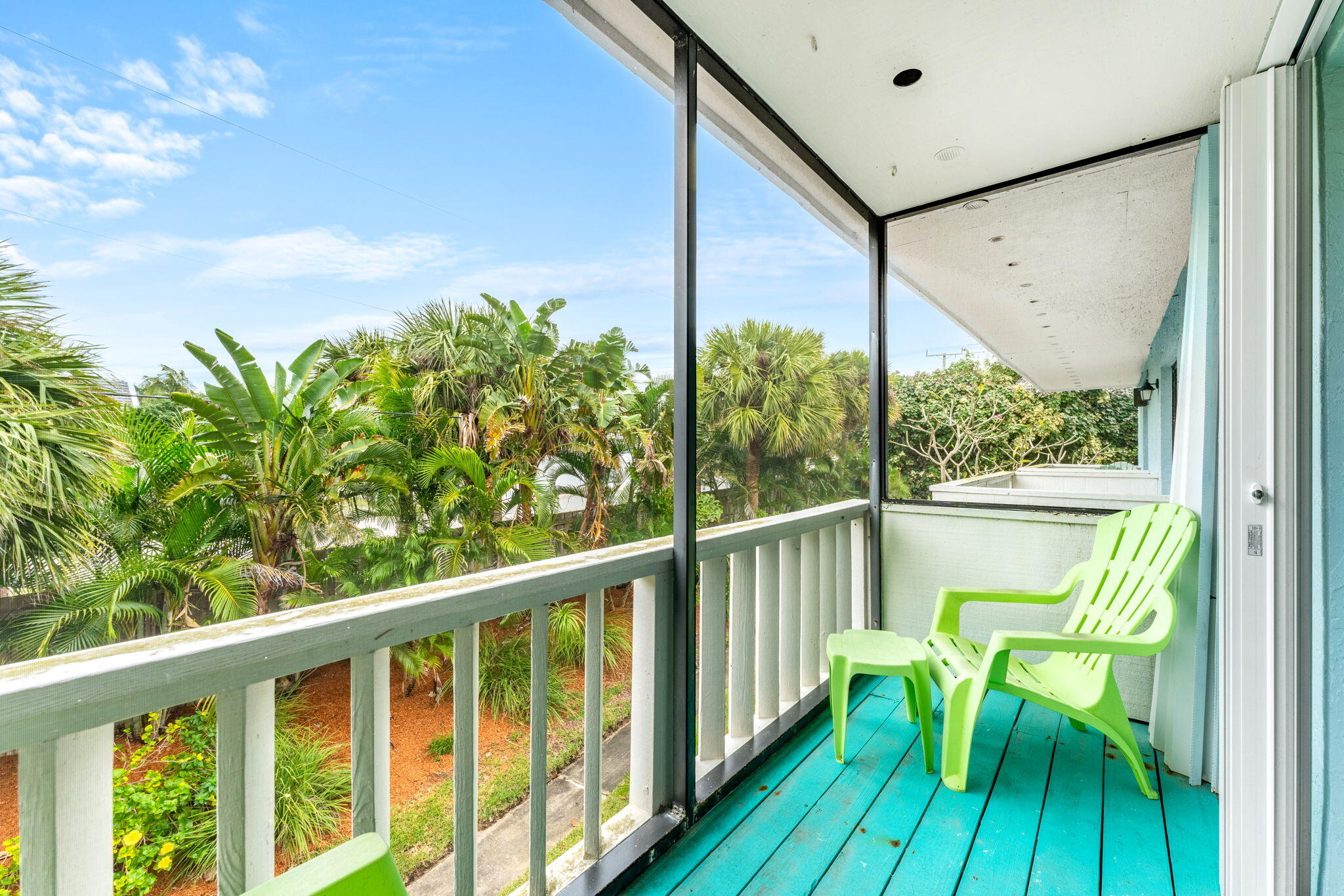 3 Cove Road, Unit 3 Melbourne Beach, FL 32951 - Photo 27 of 40 a view of a chair and table in the balcony