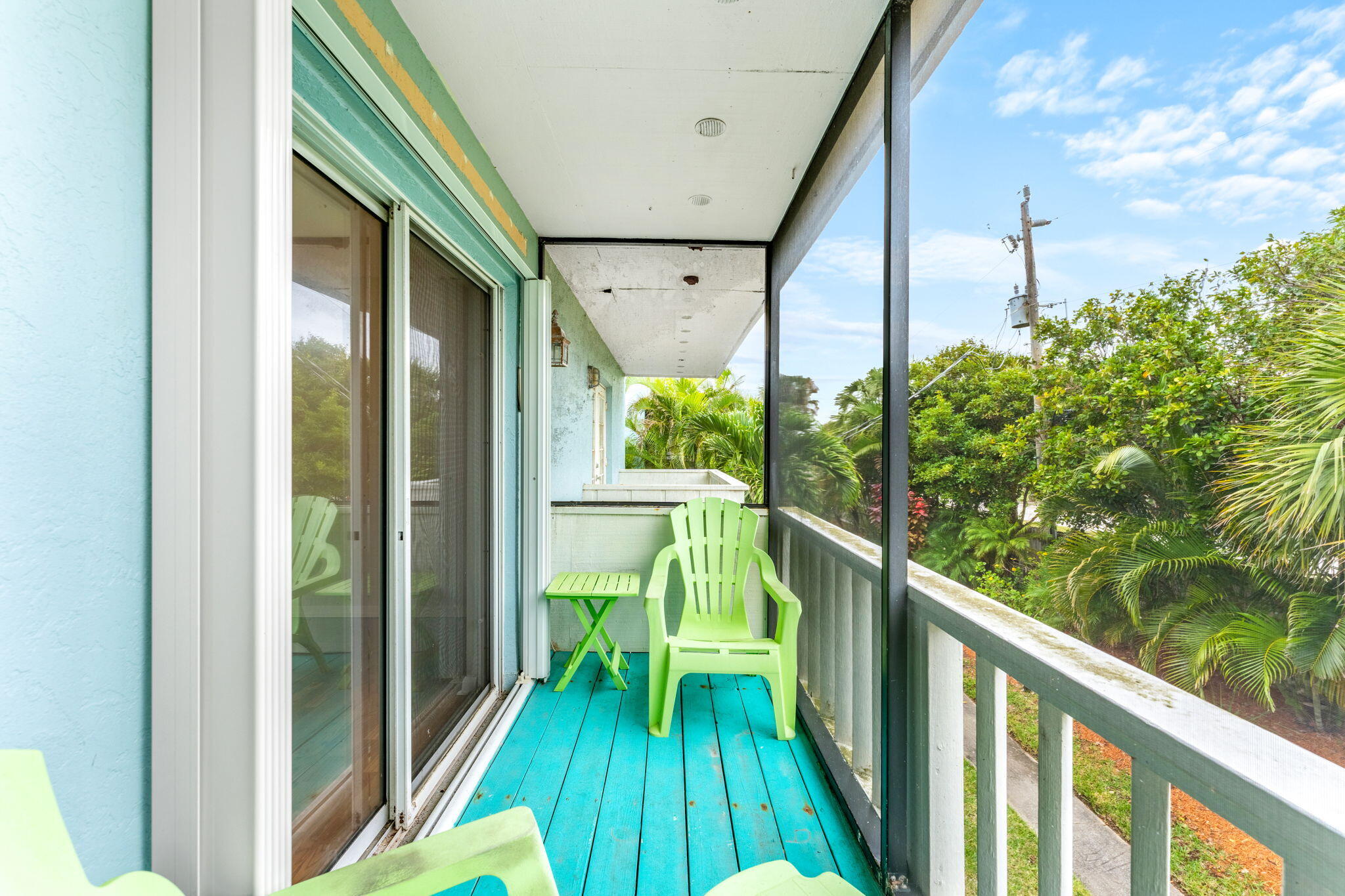 3 Cove Road, Unit 3 Melbourne Beach, FL 32951 - Photo 28 of 40 a view of a balcony with chairs