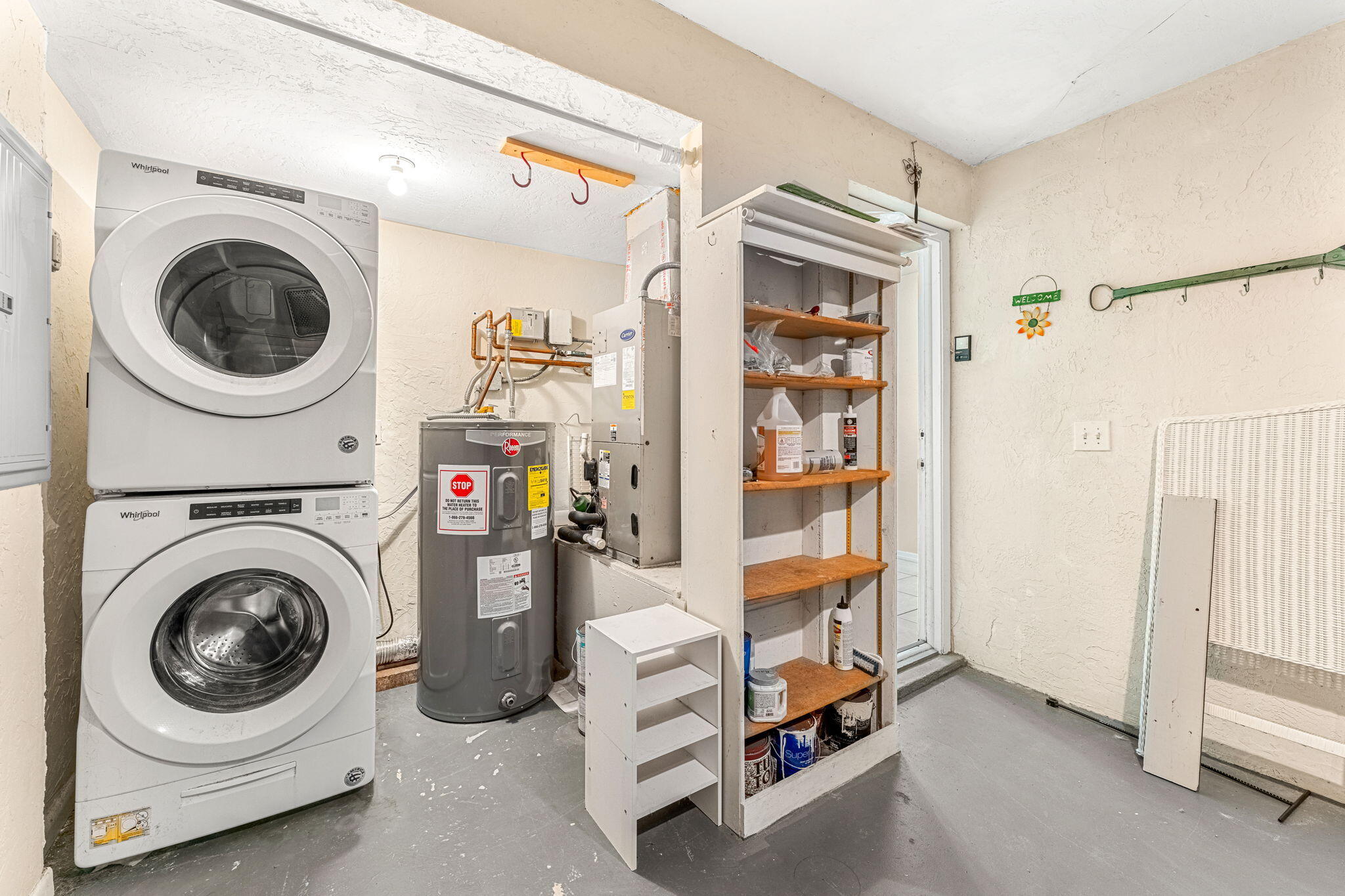 3 Cove Road, Unit 3 Melbourne Beach, FL 32951 - Photo 34 of 40 a utility room with dryer and washer