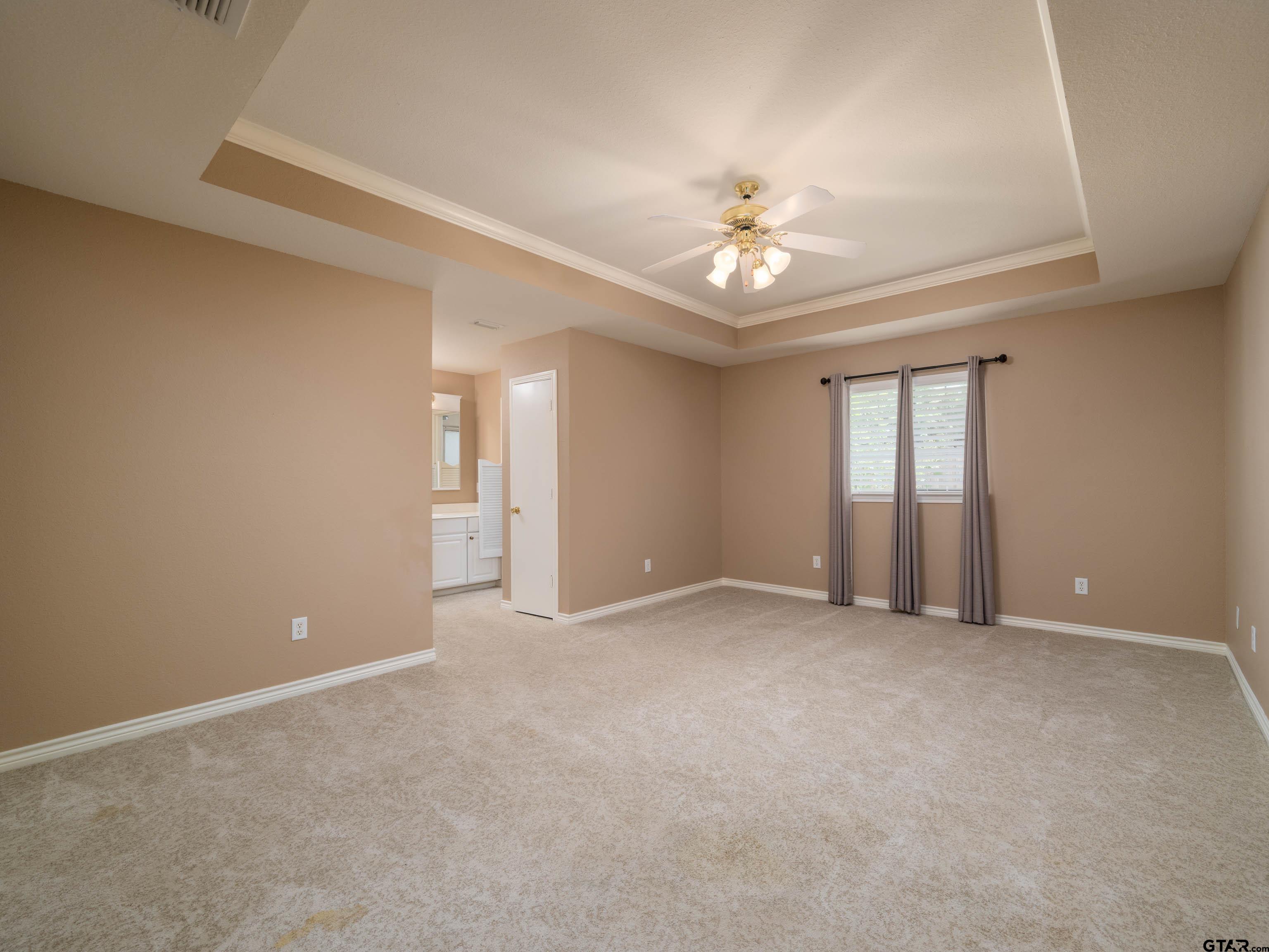 1521 Rice Road Tyler, TX 75703 - Photo 11 of 23 a view of an empty room with a window