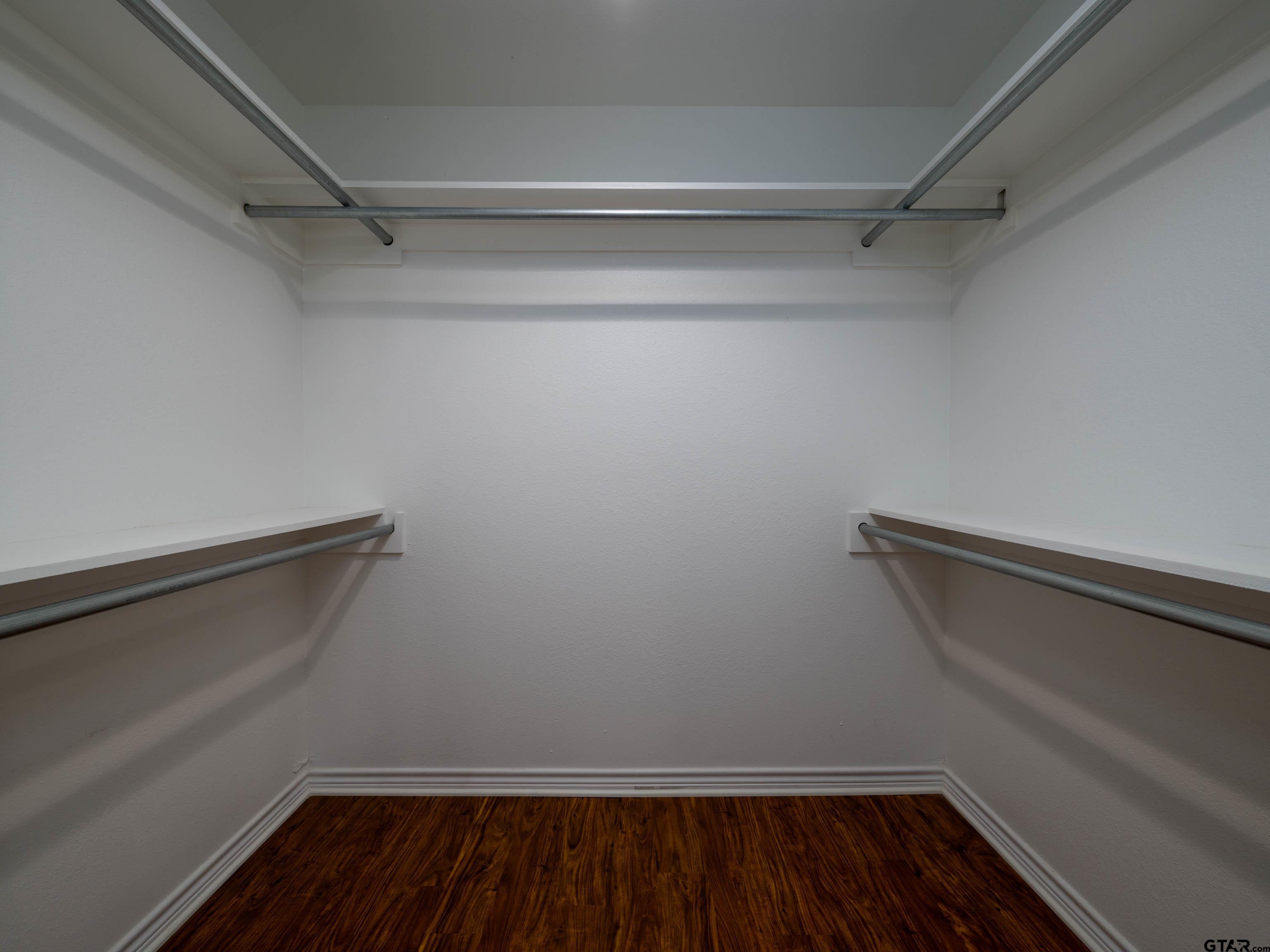 1521 Rice Road Tyler, TX 75703 - Photo 14 of 23 a view of an empty walk in closet