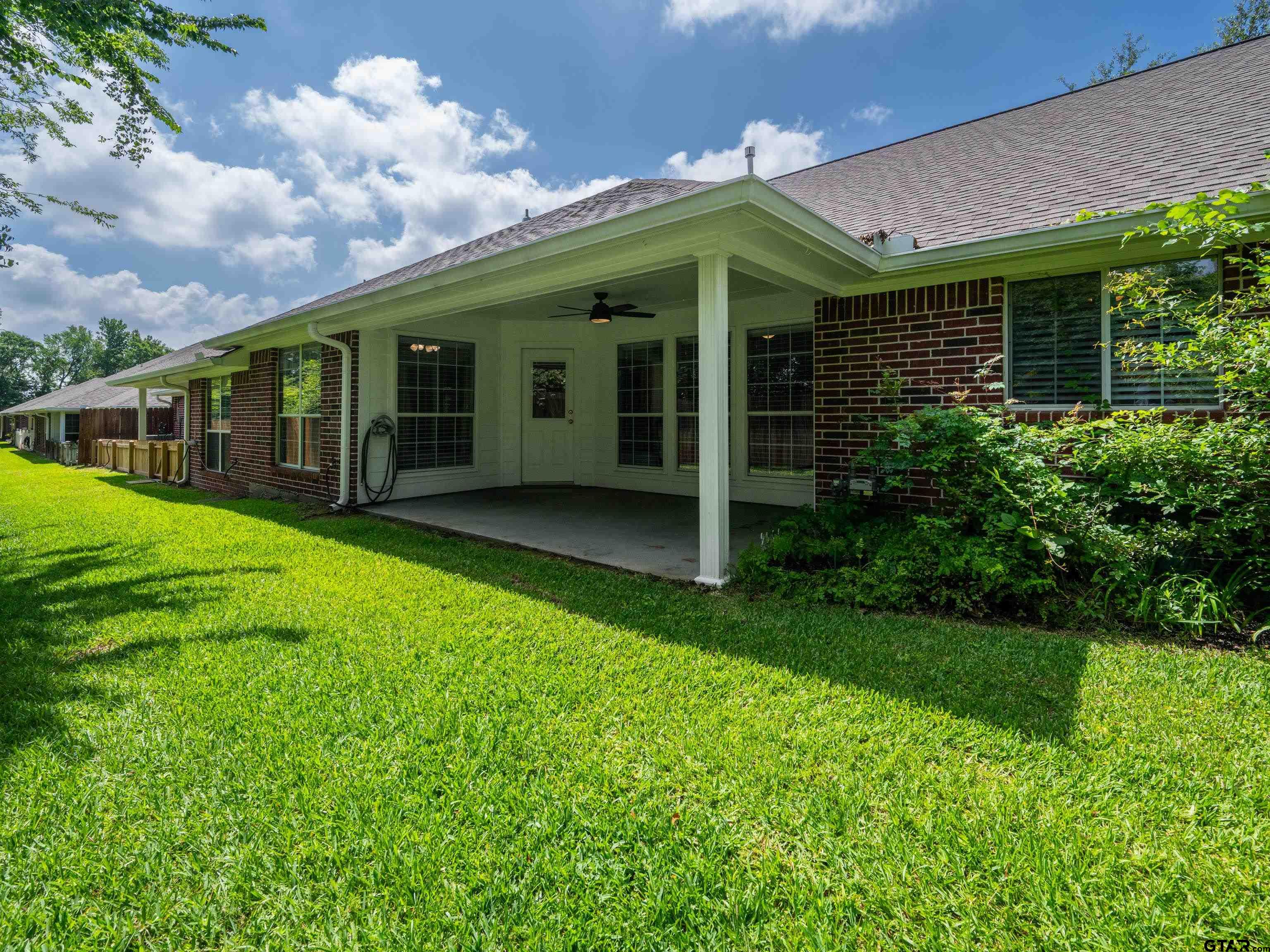 1521 Rice Road Tyler, TX 75703 - Photo 23 of 23 a view of a house with a garden