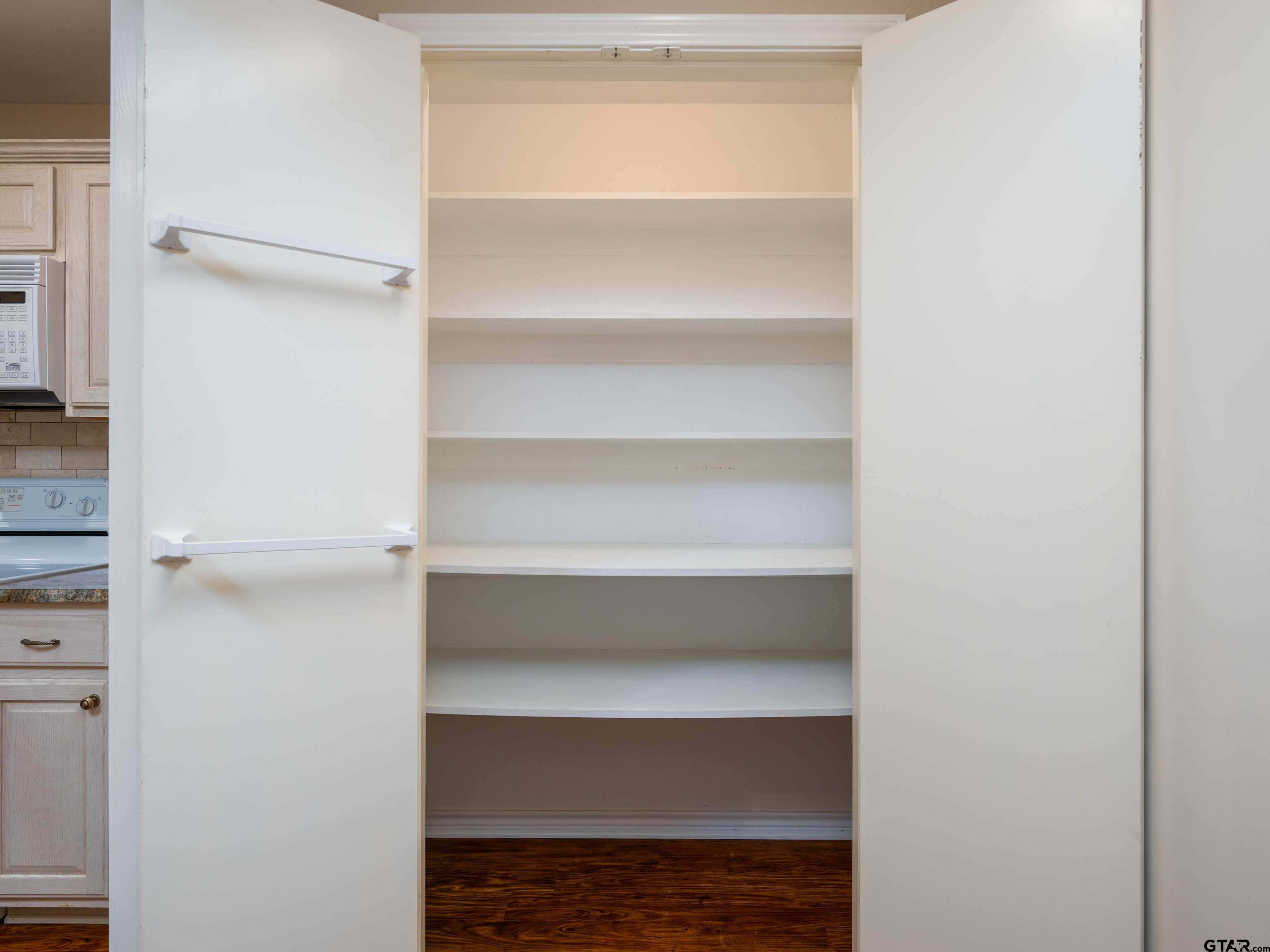 1521 Rice Road Tyler, TX 75703 - Photo 10 of 23 a view of an empty walk in closet