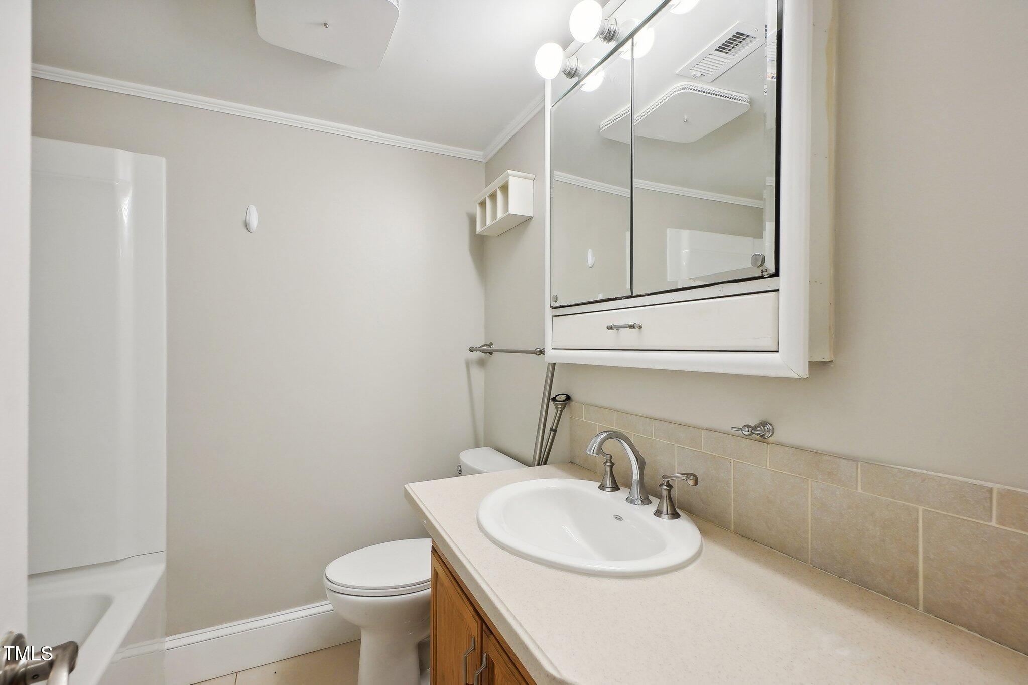 5004 Flint Ridge Place Raleigh, NC 27609 - Photo 14 of 22 15-web-or-mls-Flint Ridge Pl 5004-015
