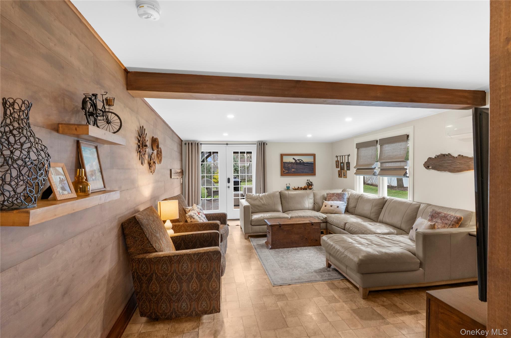117 Union Avenue Islip, NY 11751 - Photo 11 of 33 a living room with furniture and a large window