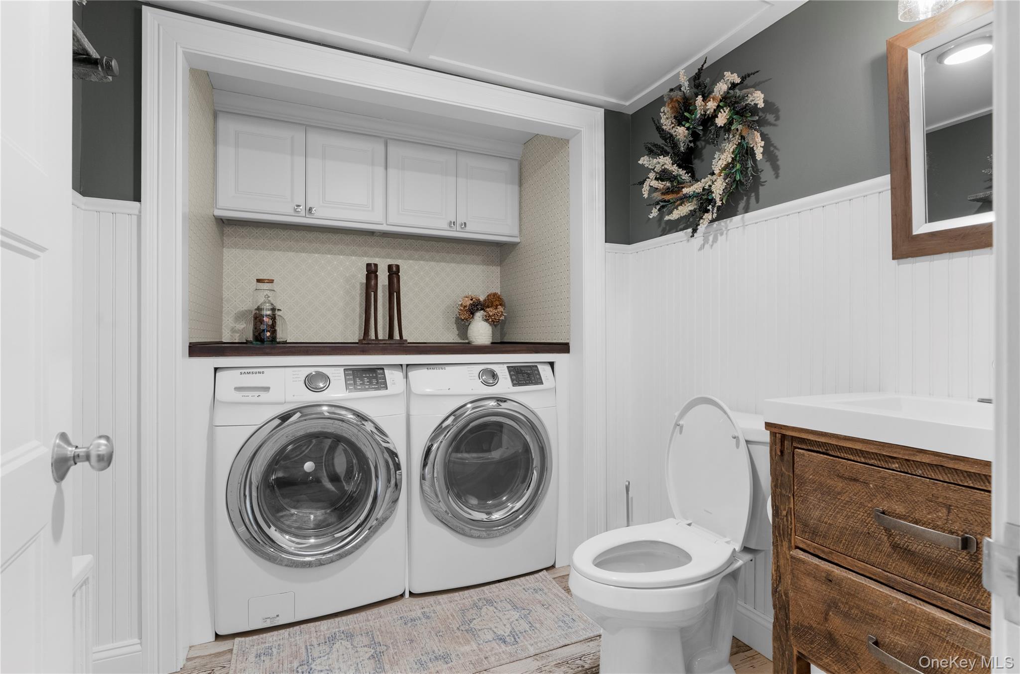 117 Union Avenue Islip, NY 11751 - Photo 17 of 33 a close view of a utility room with dryer and washer