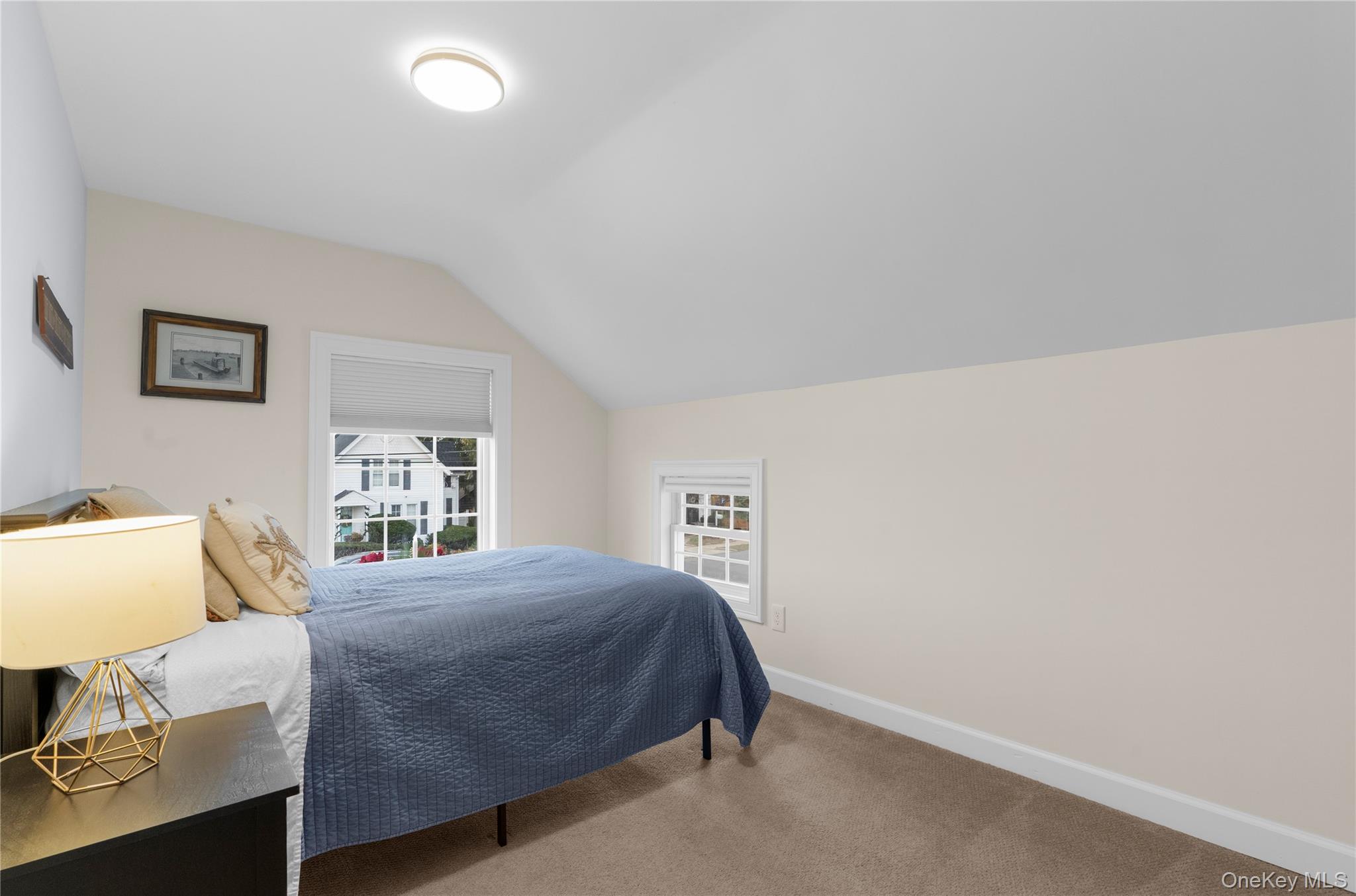 117 Union Avenue Islip, NY 11751 - Photo 20 of 33 a bedroom with a bed and window