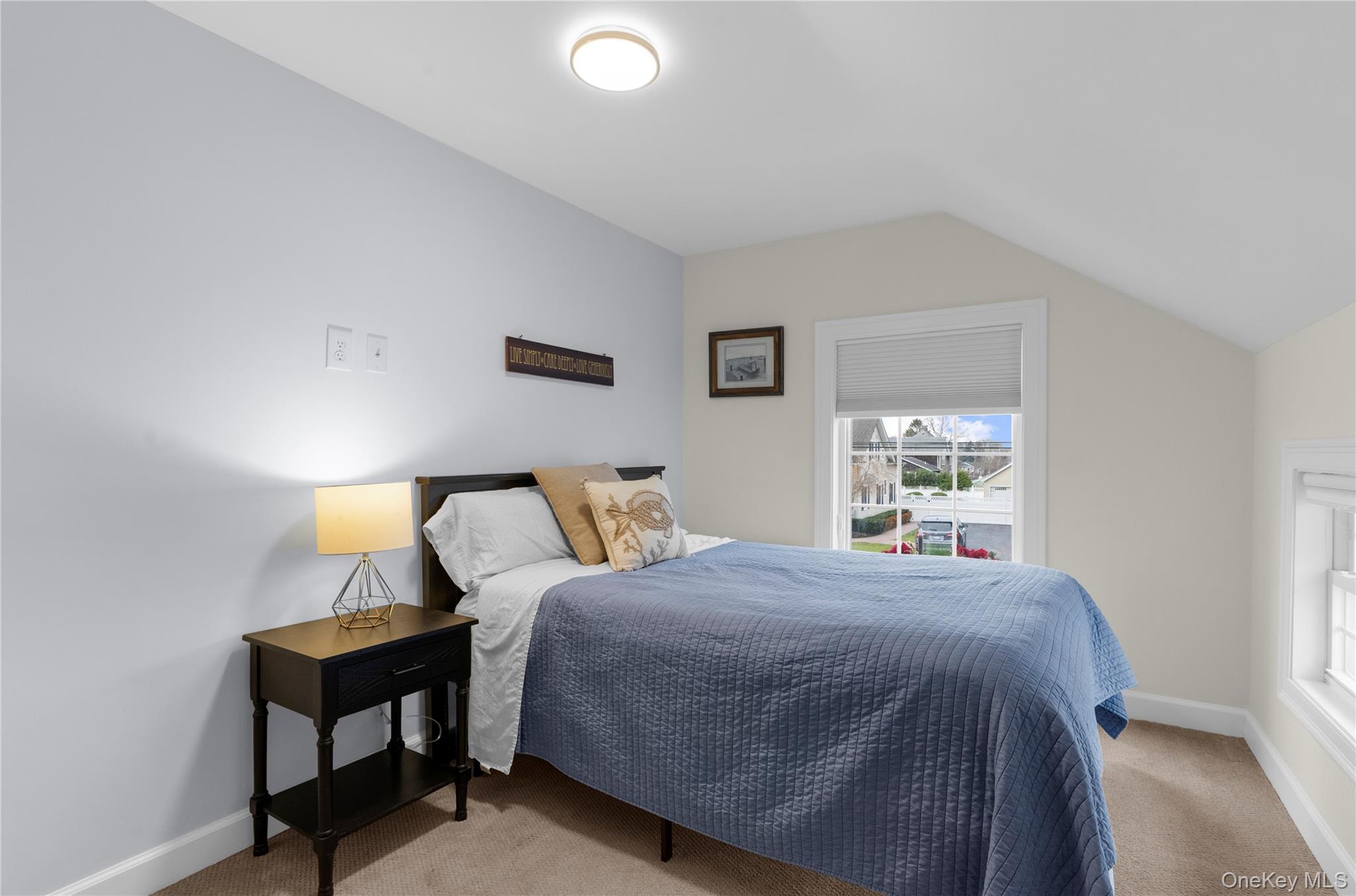 117 Union Avenue Islip, NY 11751 - Photo 21 of 33 a bedroom with a bed and window