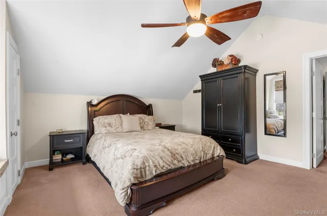 a kitchen with a window and cabinets