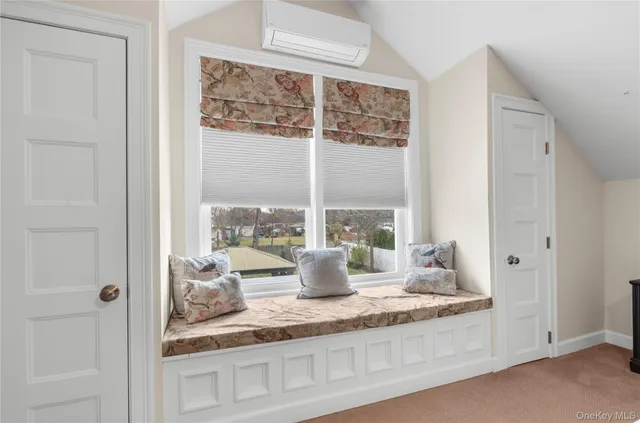 a bedroom with a bed and furniture