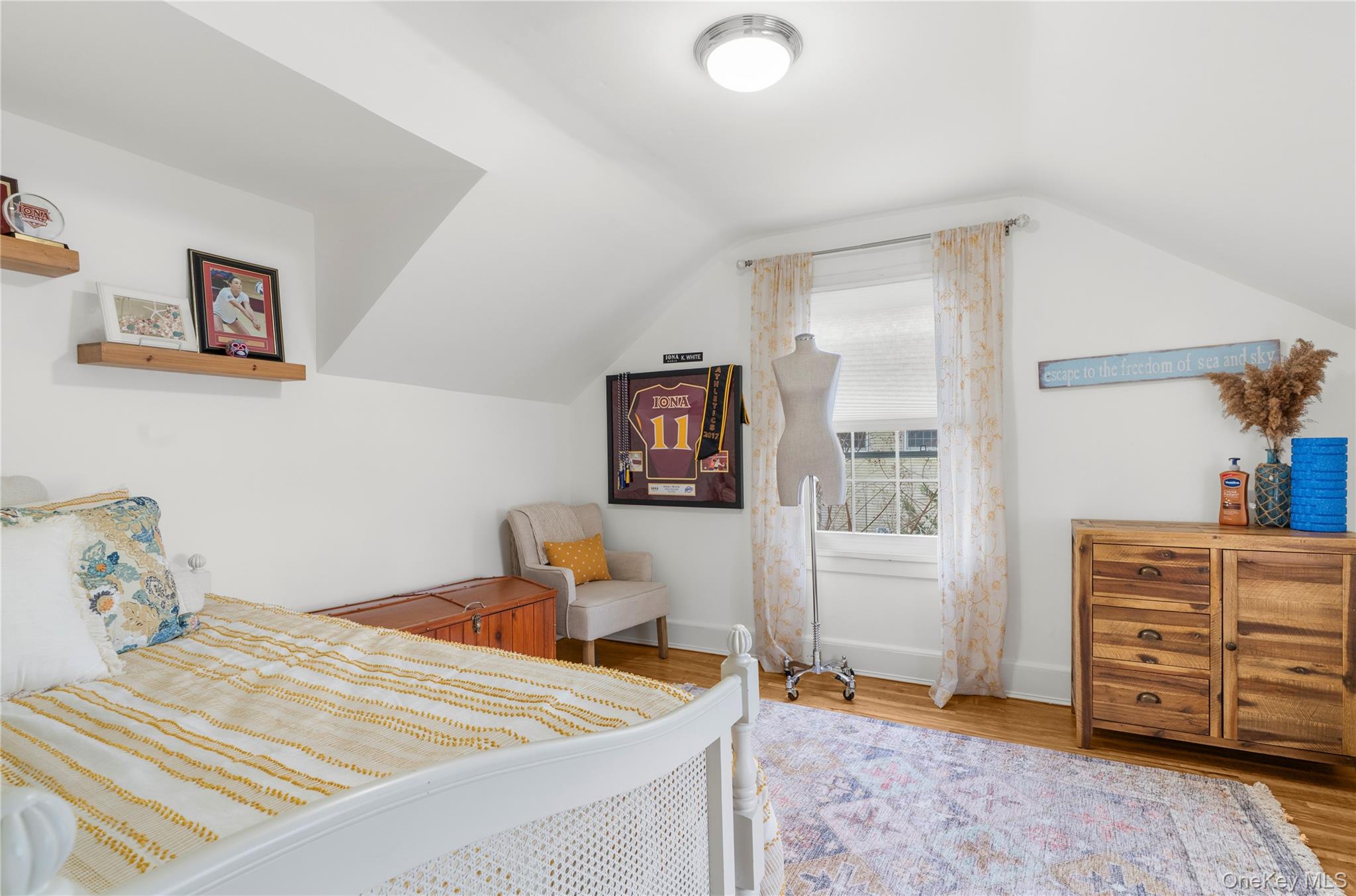 117 Union Avenue Islip, NY 11751 - Photo 27 of 33 a bedroom with a bed and furniture